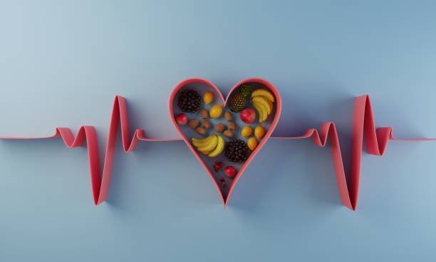 Fresh oily fish rich in cholesterol, like mackerel or sardines, displayed on ice at a seafood market.